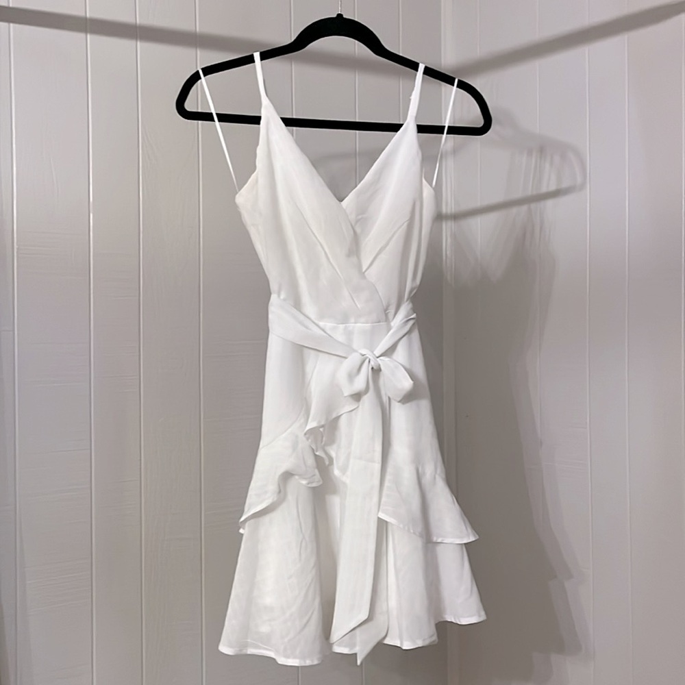 white ruffled dress , size small